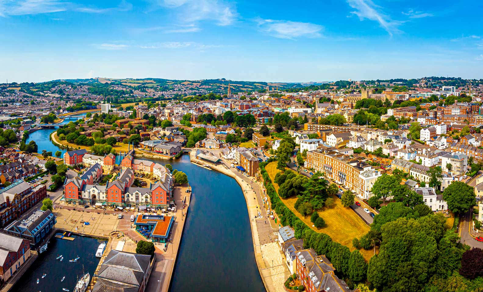 Scenic Exeter Cityscape At Dawn Wallpaper