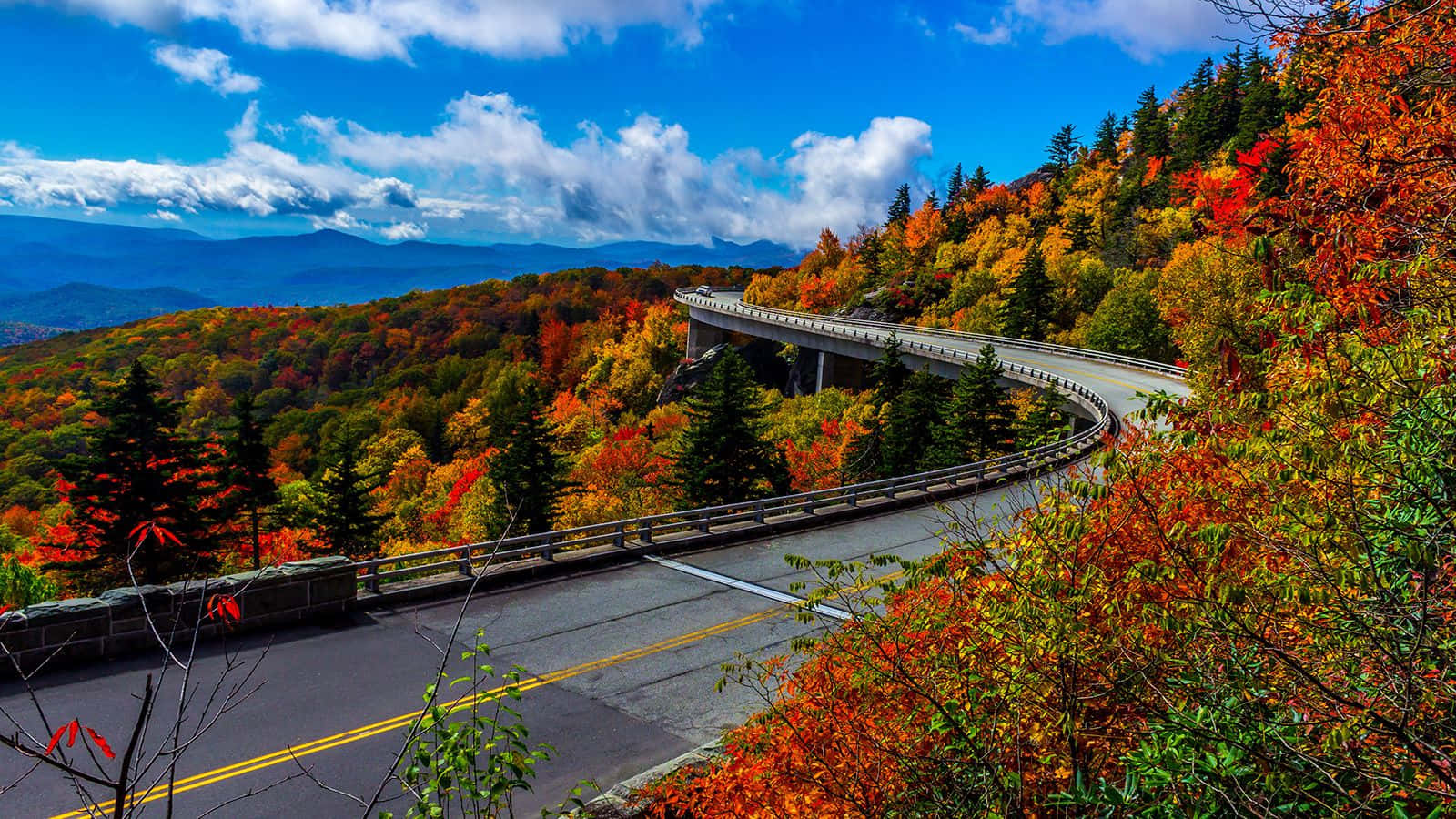 Scenic Fall Road Journey Wallpaper