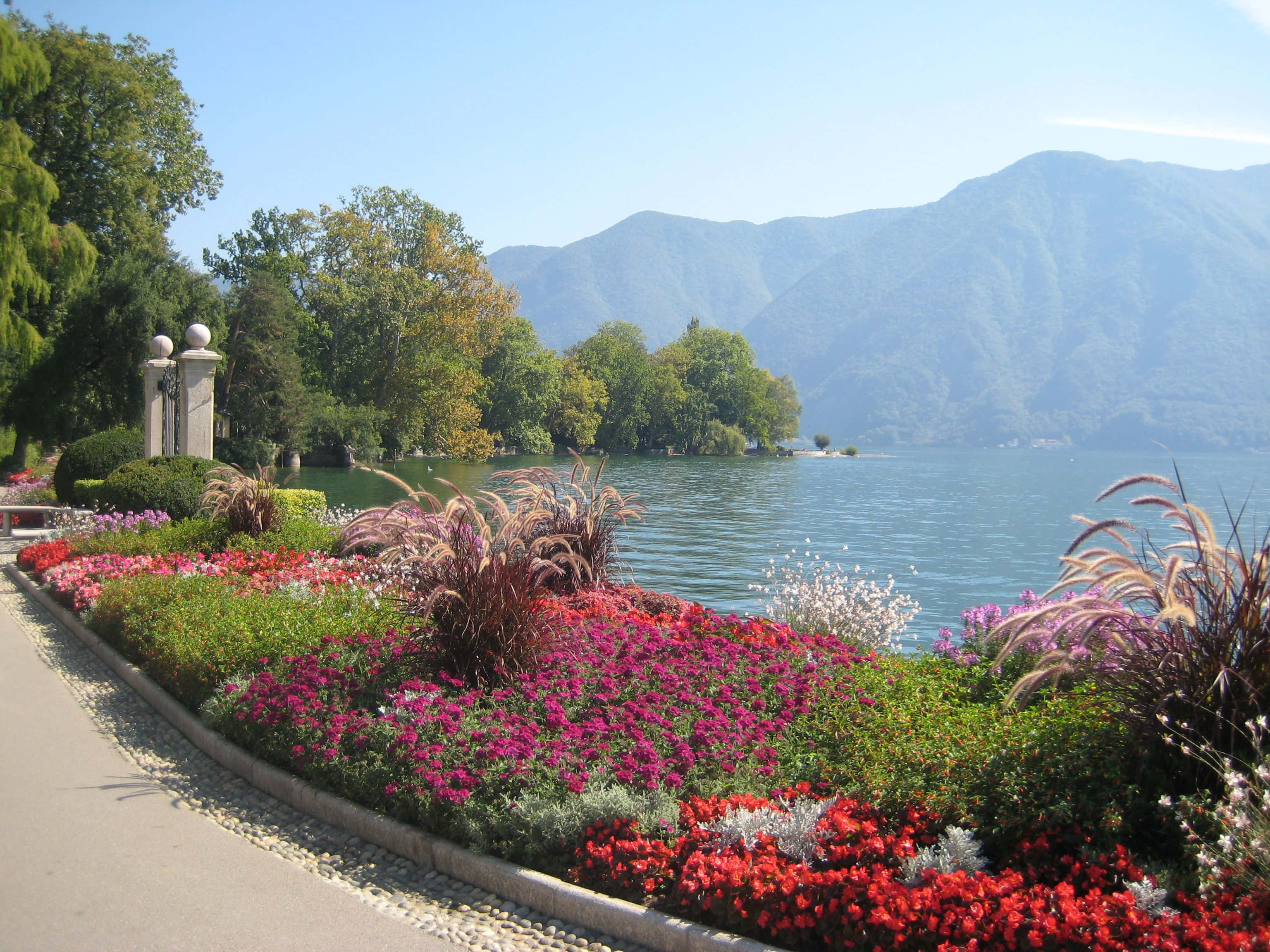 Scenic View Of Beautiful Lake Lugano At Sunset, Switzerland Wallpaper