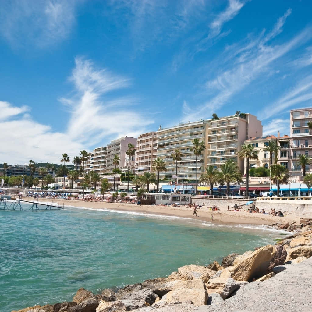 Scenic View Of French Beach On A Sunny Day Wallpaper