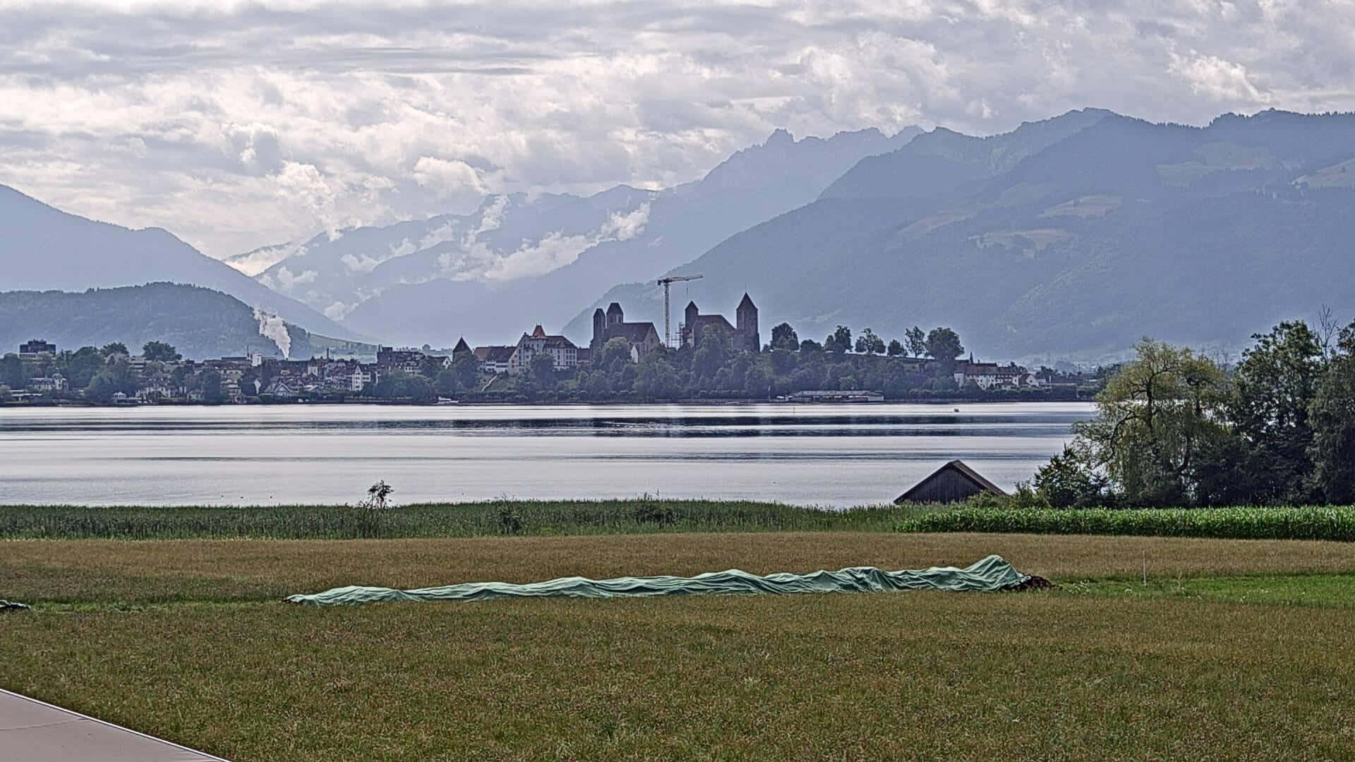 Scenic View Of Rapperswil-jona, Switzerland At Sunset Wallpaper