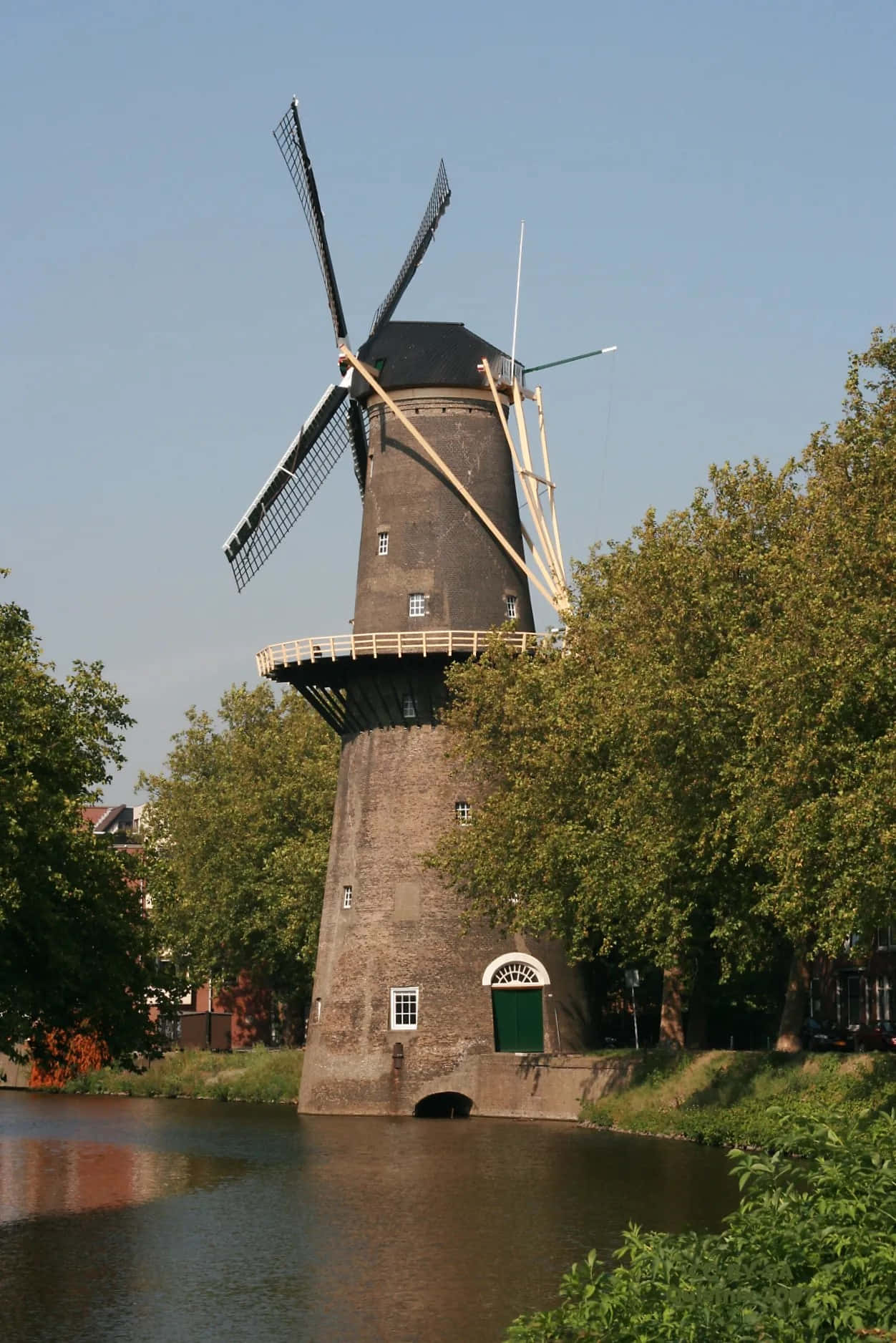 Schiedam Windmill By The Water Wallpaper