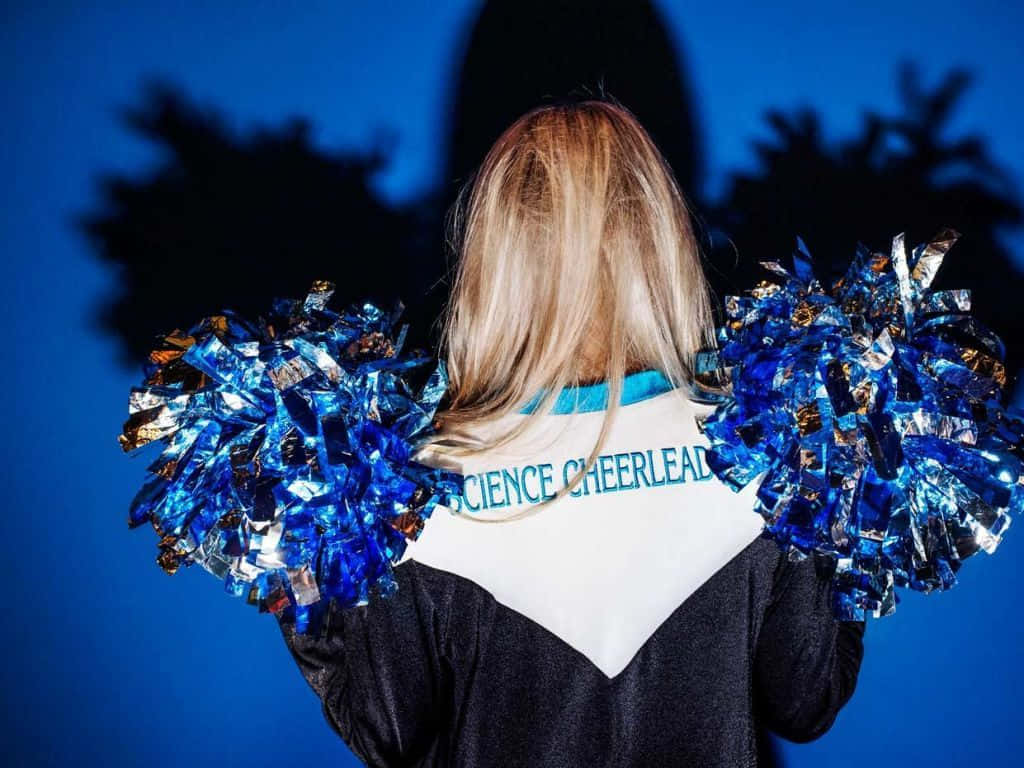 Science Cheerleaderwith Pom Poms Wallpaper