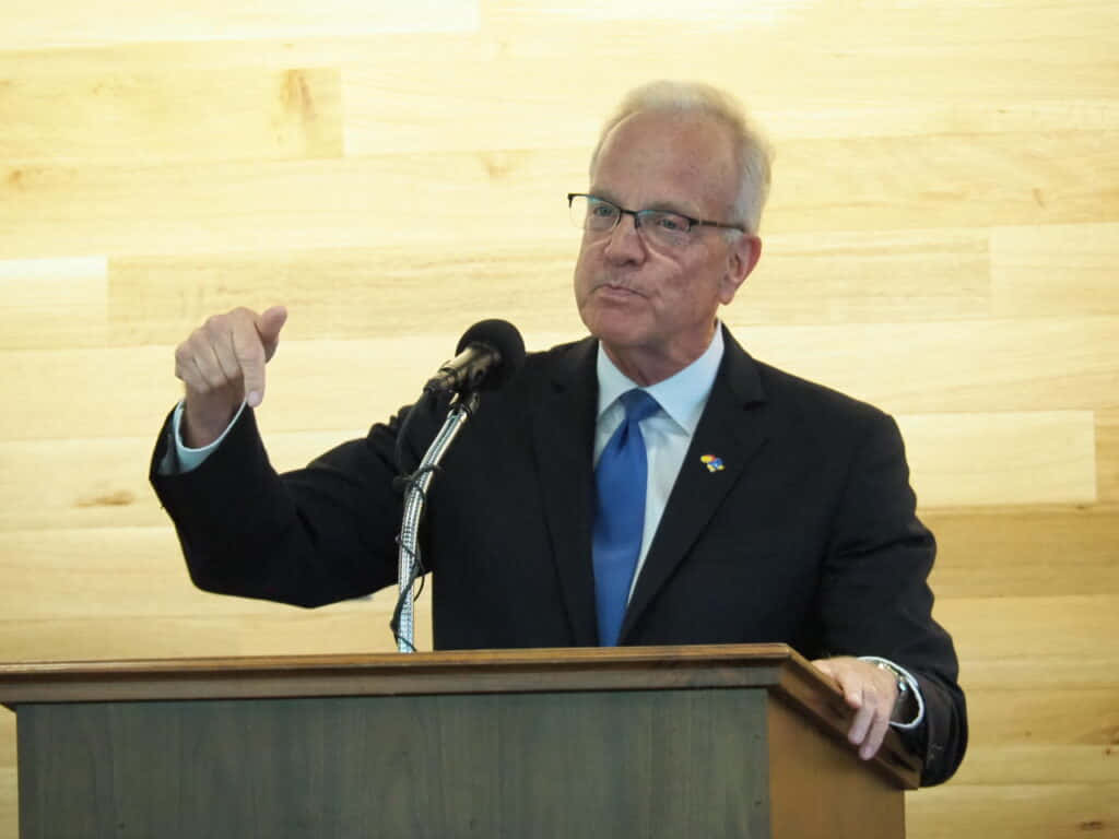 Senator Jerry Moran Delivering A Speech Wallpaper