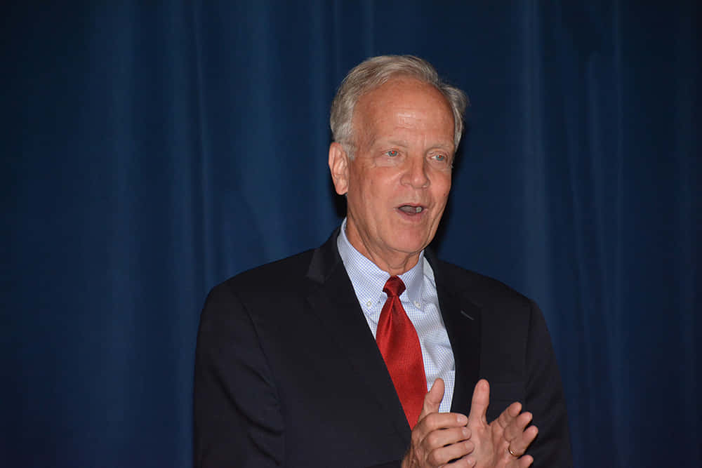 Senator Jerry Moran Delivering A Speech Wallpaper