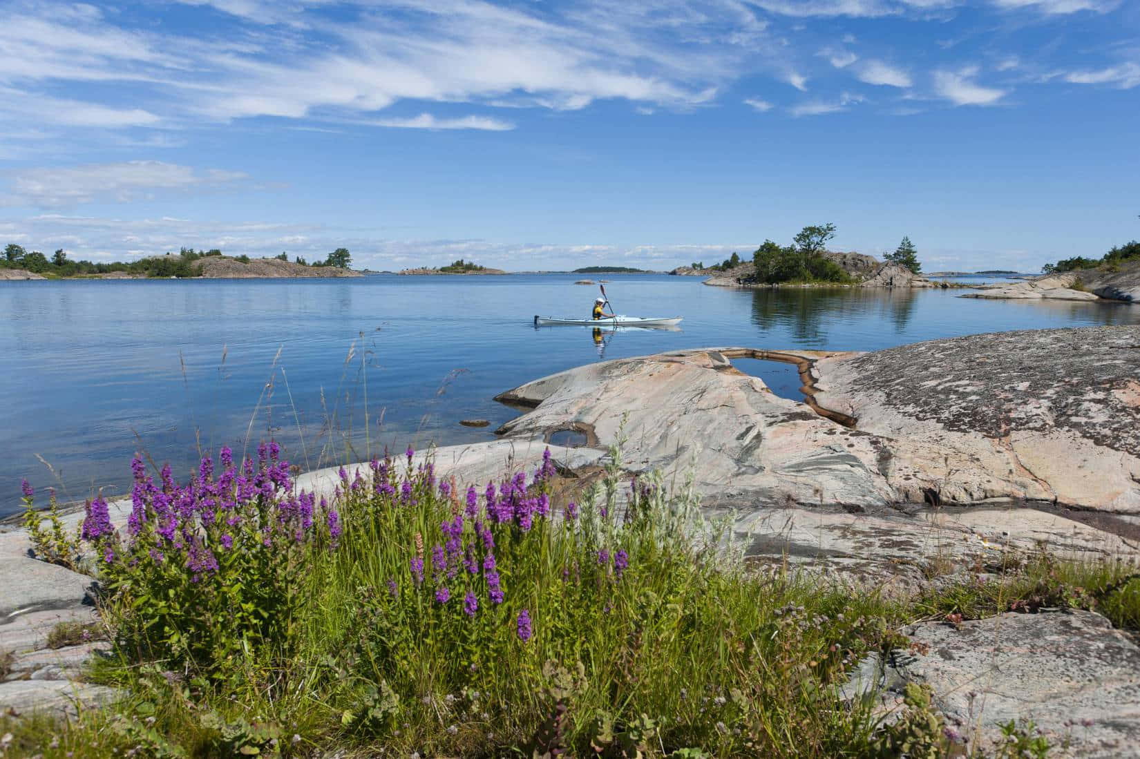 Serene Archipelago Kayaking Wallpaper