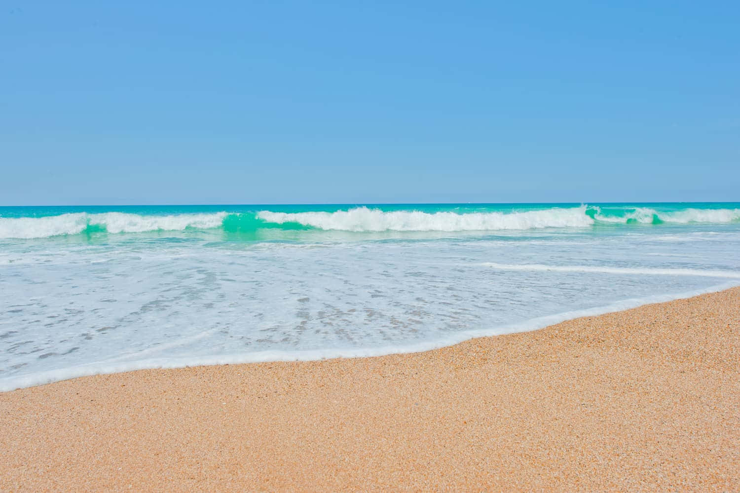 Serene French Beach With Crystal Clear Waters Wallpaper