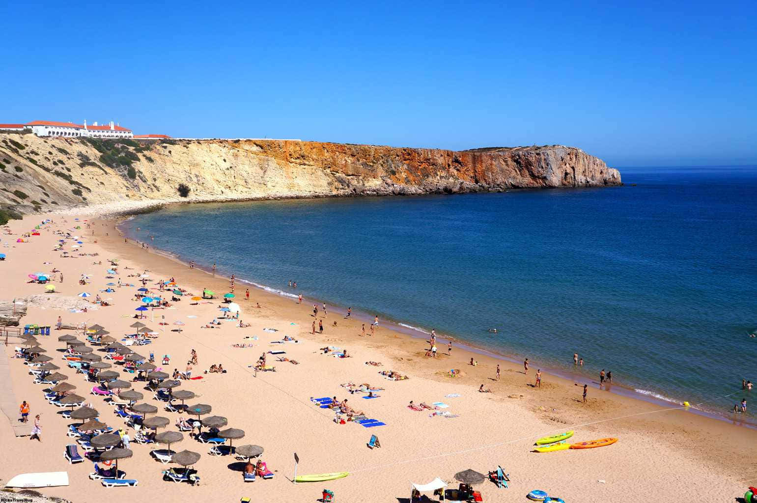 Serene Portuguese Beach At Sunset Wallpaper