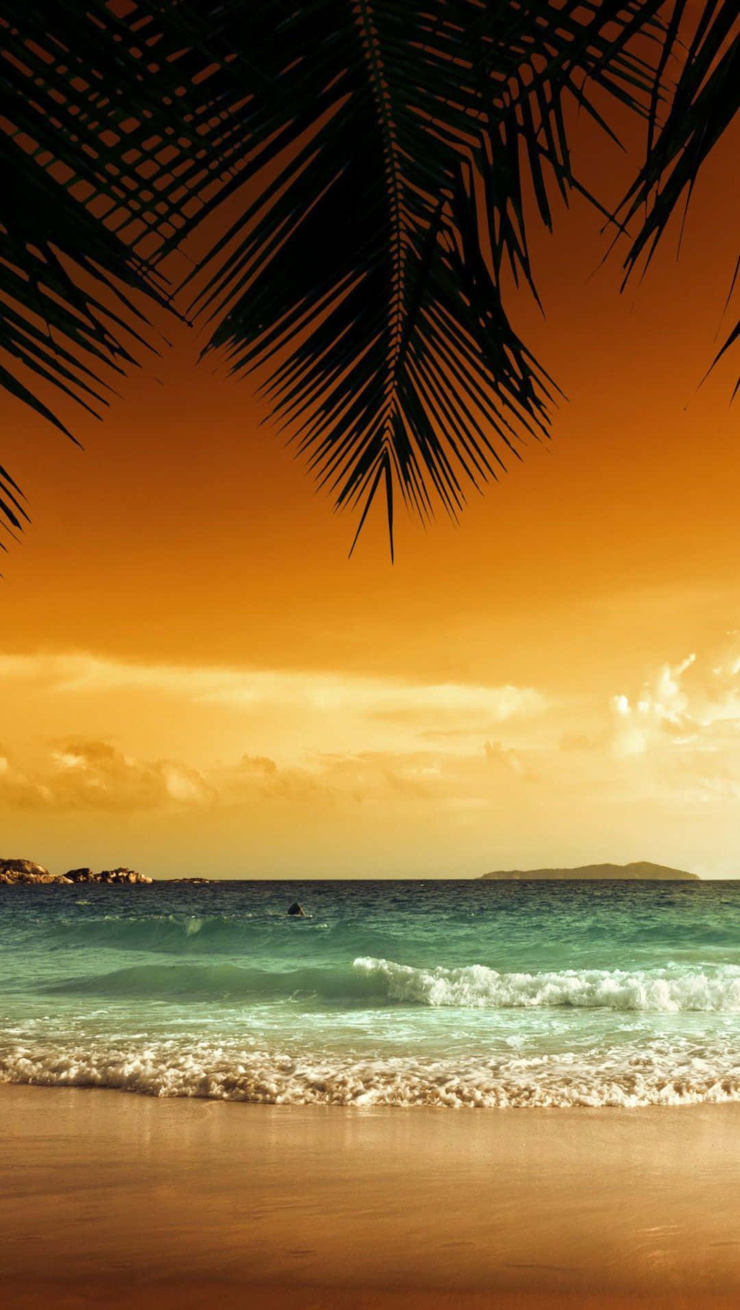 Serene Yellow Beach At Sunset Wallpaper