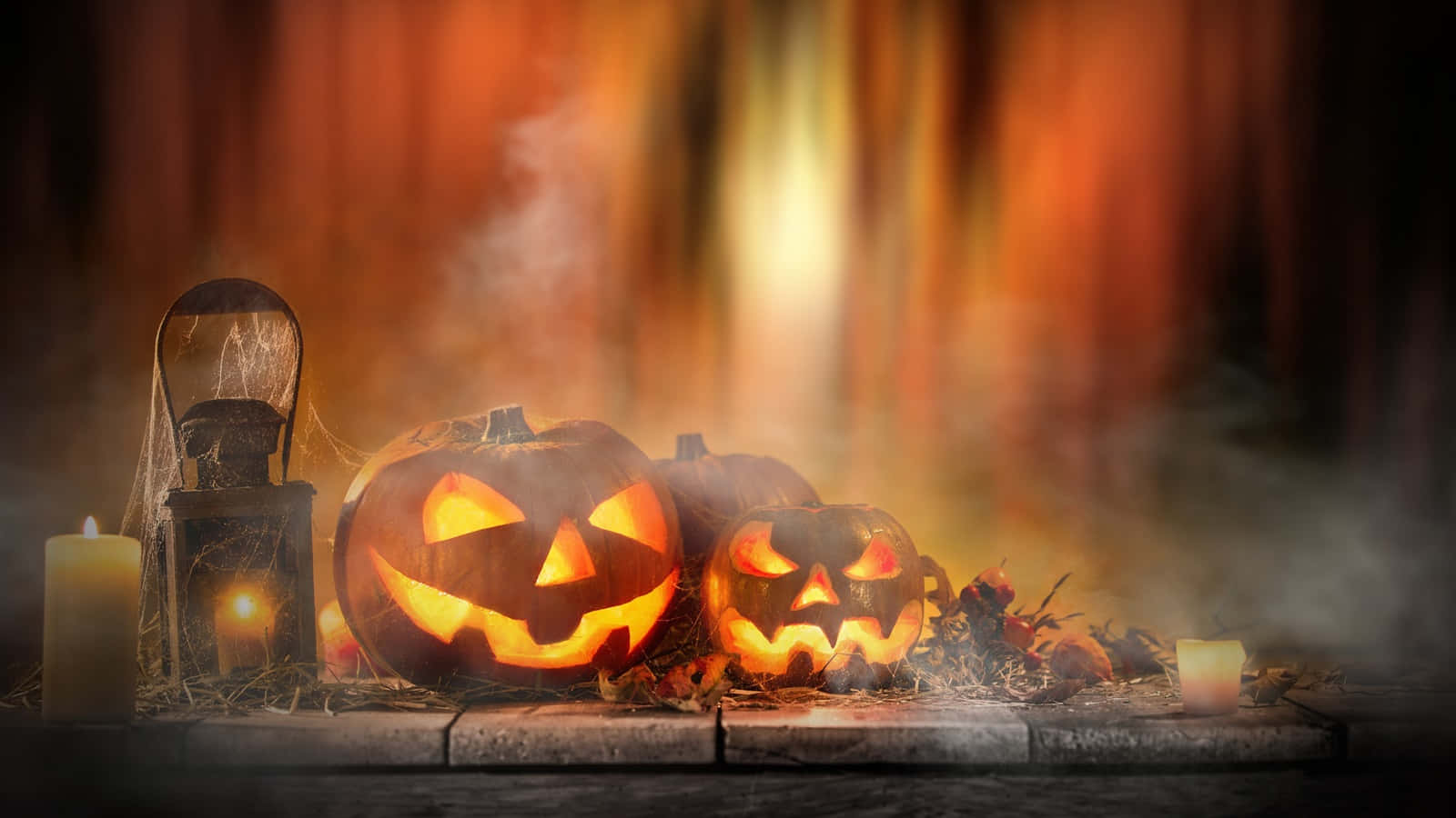 Set The Mood On Halloween Night With Flickering Candles! Wallpaper