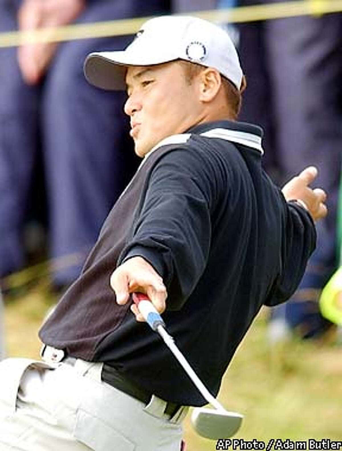 Shigeki Maruyama Demonstrating Perfect Swing Technique Wallpaper