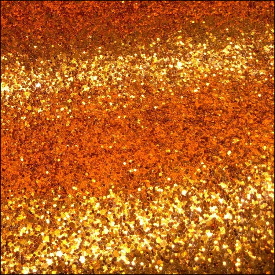 Shimmery Orange Glitter Background Wallpaper