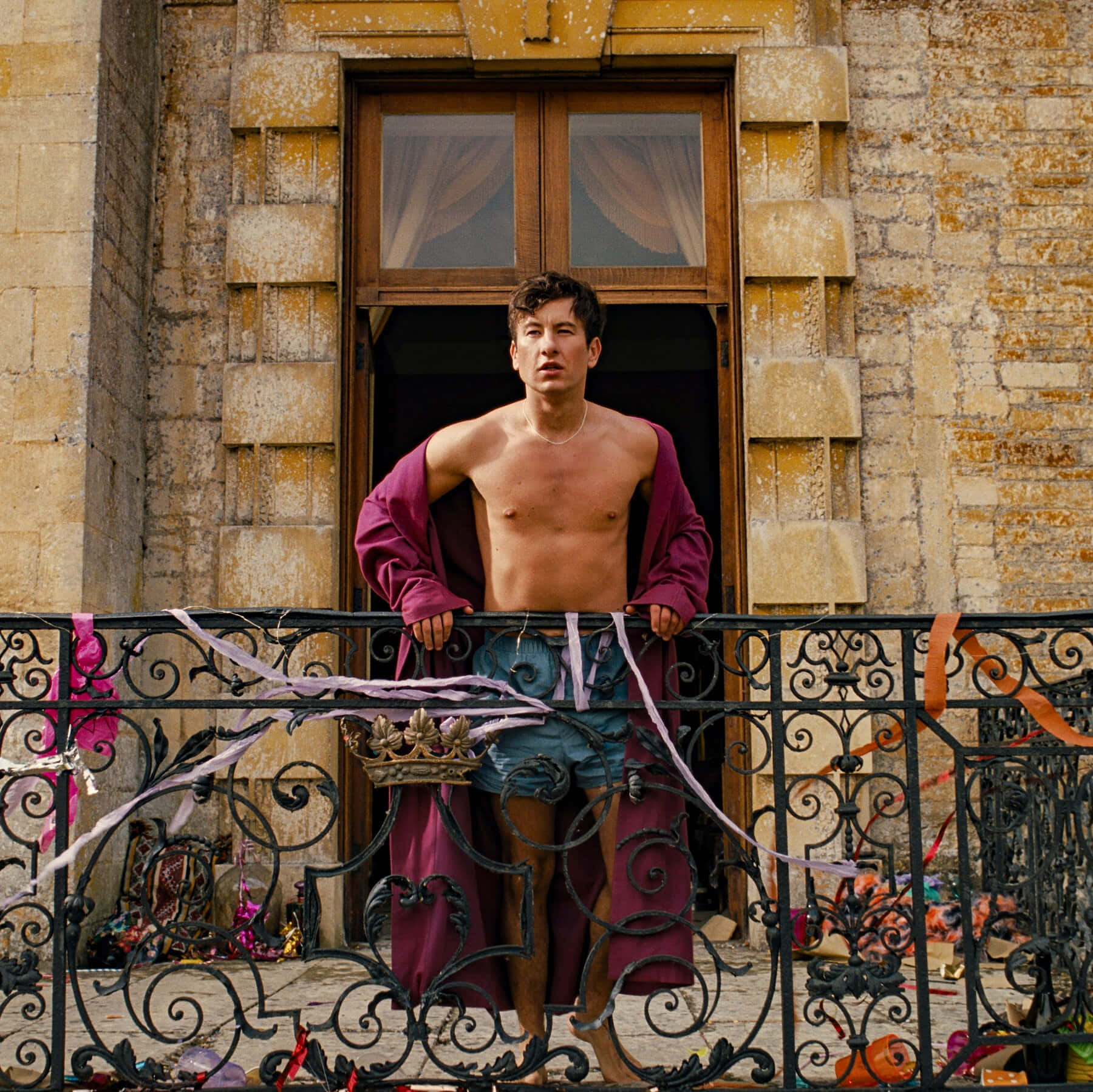 Shirtless Manon Balconywith Ornate Railing Wallpaper