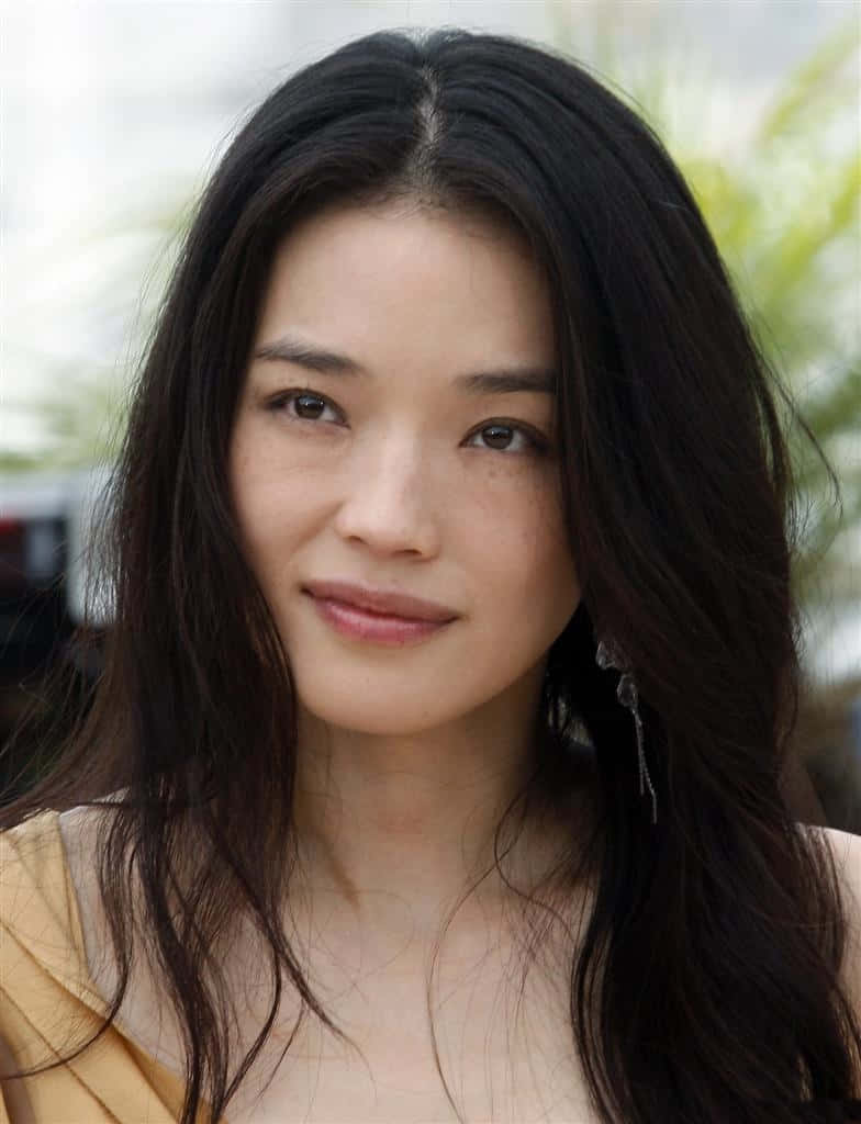 Shu Qi Stunningly Captured In A Candid Moment Wallpaper