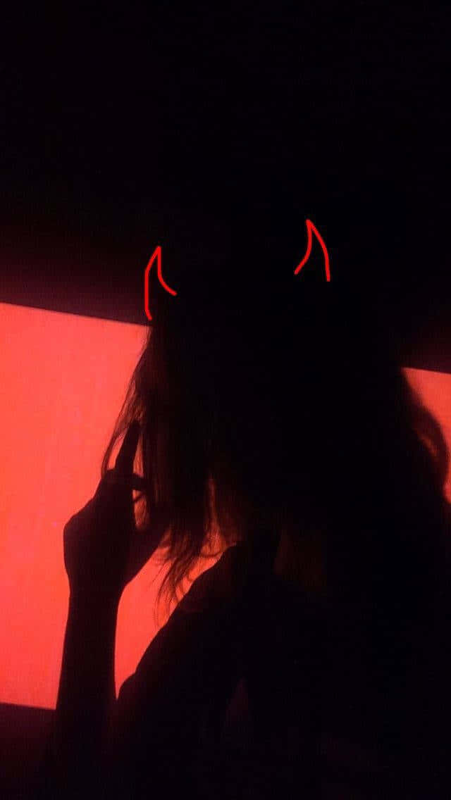 Silhouetted Demon Horns Red Glow.jpg Wallpaper