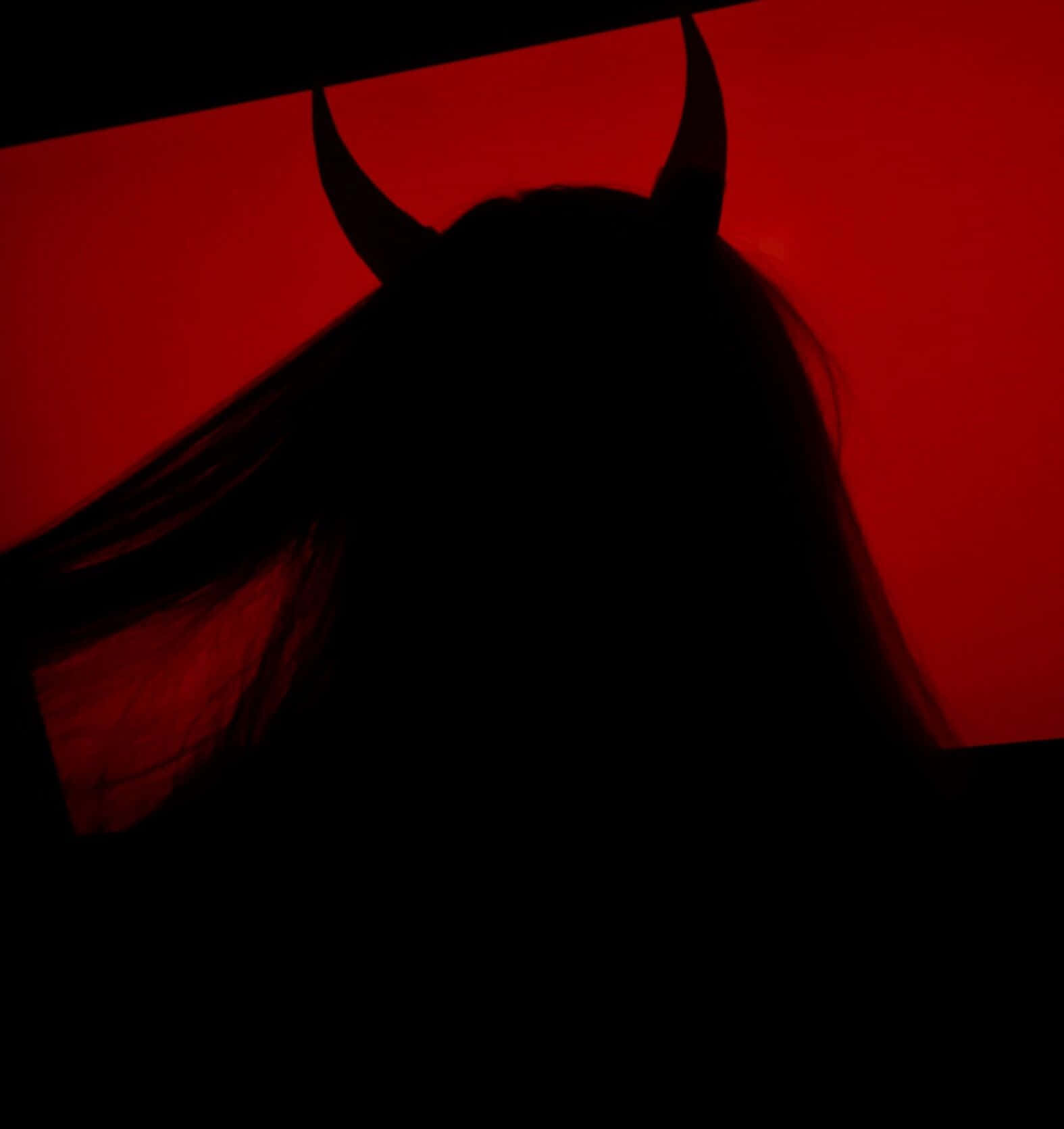 Silhouetteof Demon Horns Wallpaper