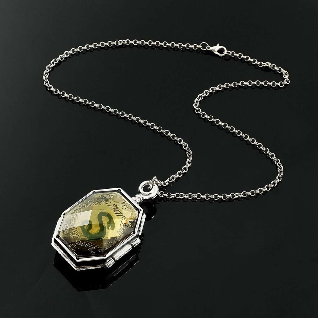 Silver Locket Pendantwith Green Stone Wallpaper