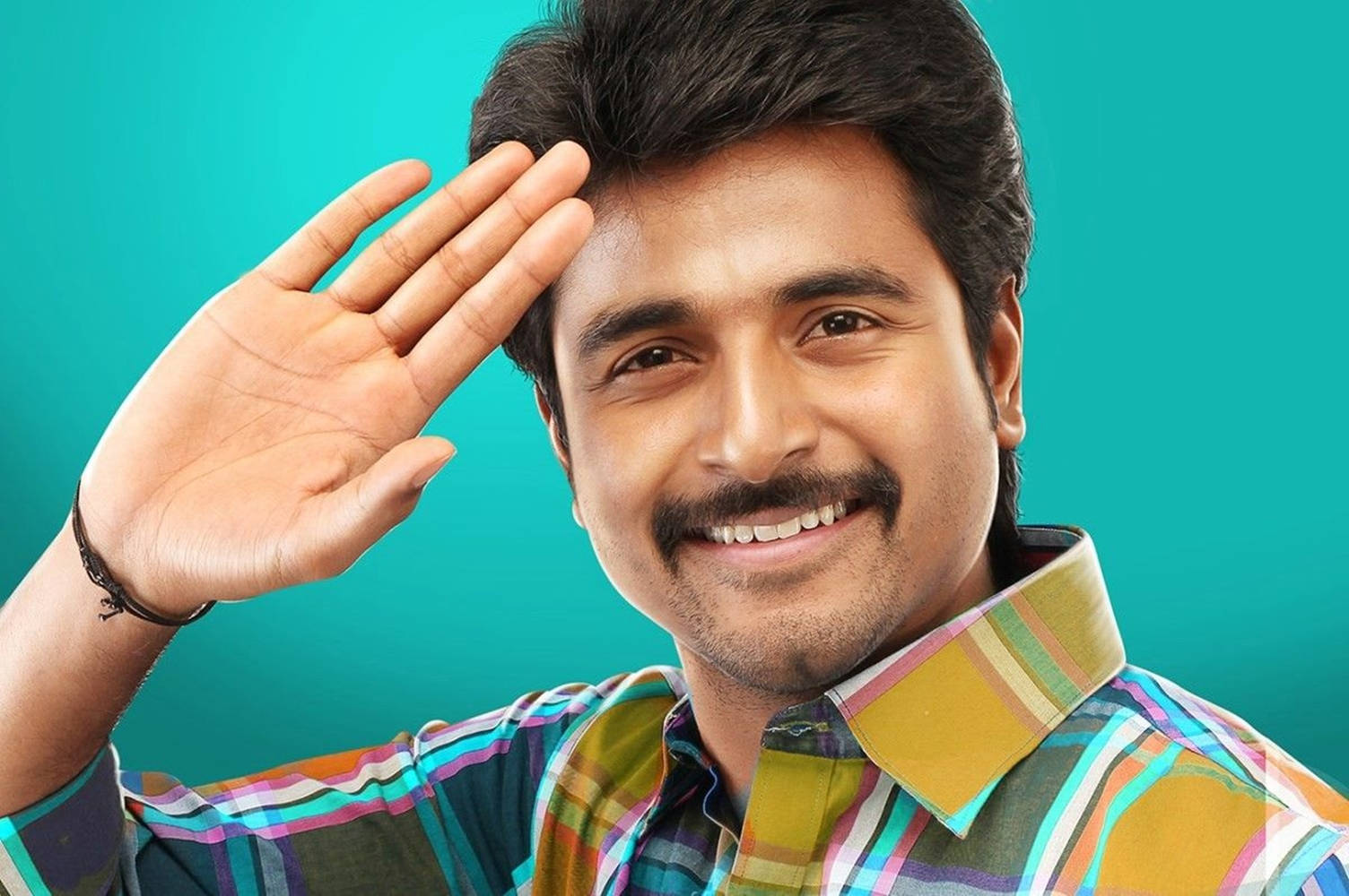 Sivakarthikeyan Waving With Smile Wallpaper