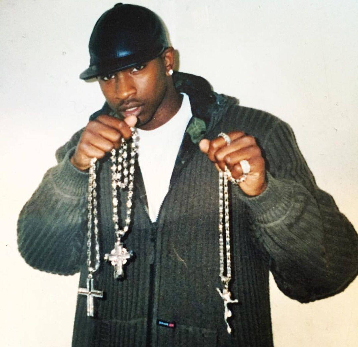 Skepta Holding Multiple Rosaries Wallpaper