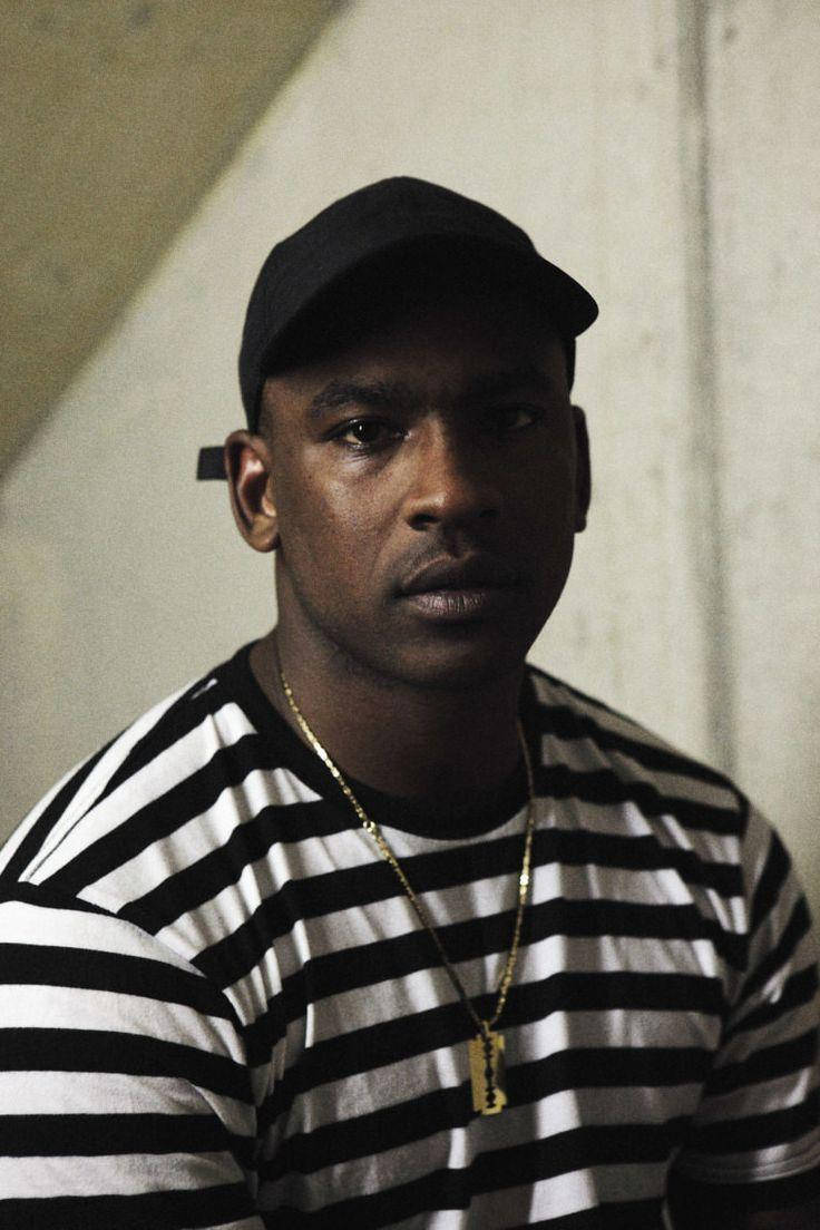 Skepta With Golden Dog Tag Wallpaper