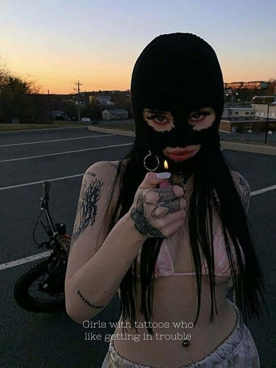 Ski Mask Girl With A Lighter Wallpaper