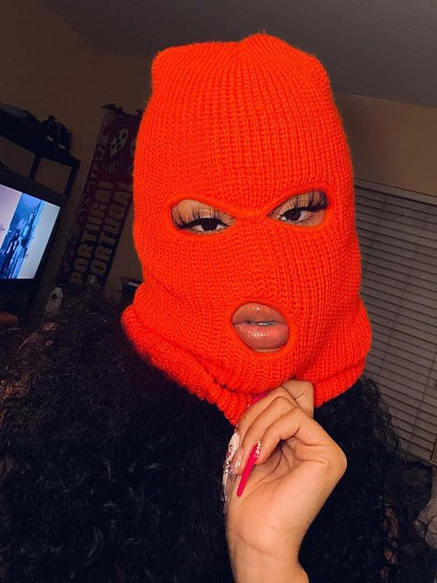 Ski Mask Girl With Long Eyelashes Wallpaper