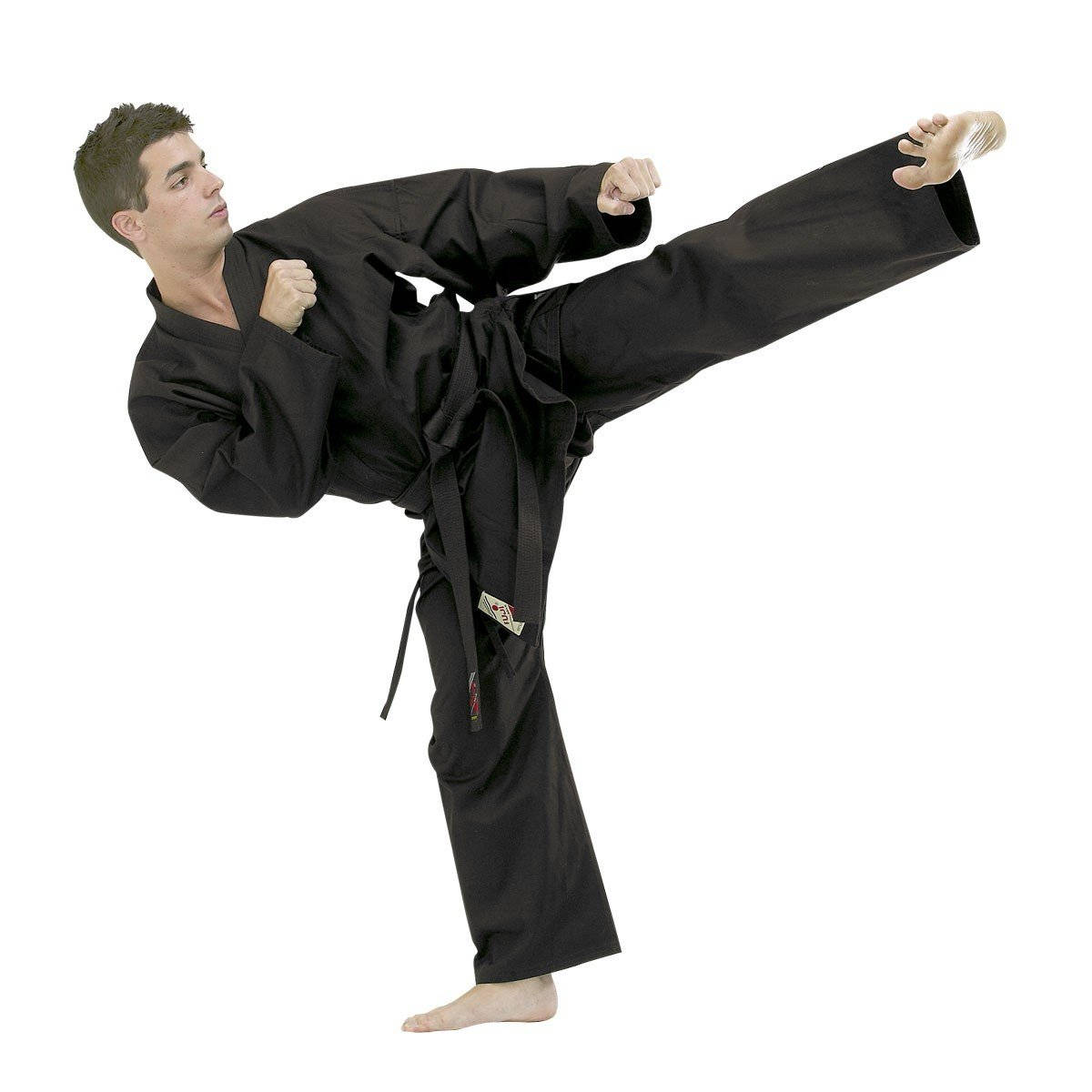 Skillful Hapkido Practitioner Exhibiting Solid Side Kick In Black Uniform Wallpaper