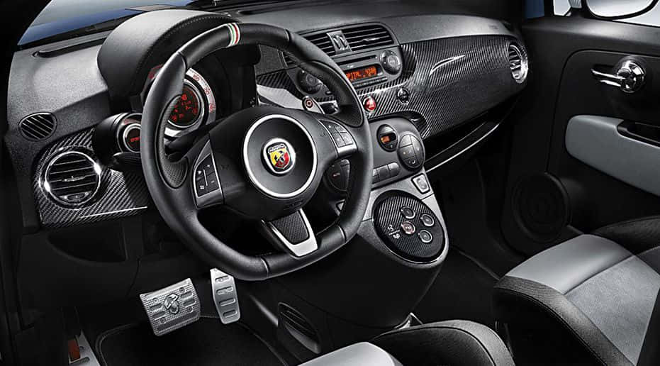 Sleek Abarth 695 Showcasing Its Dynamic Design Wallpaper