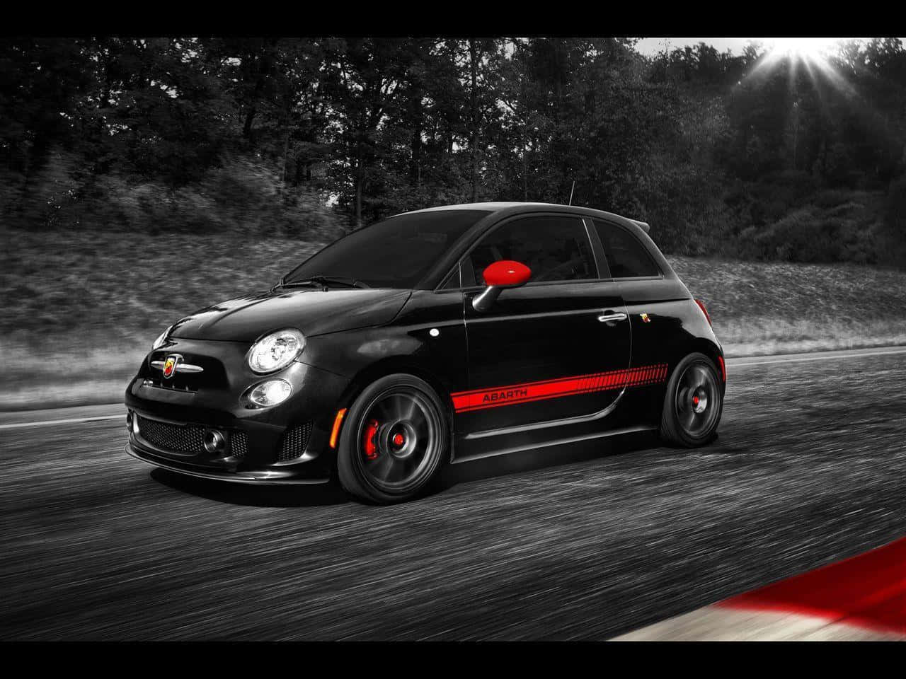 Sleek Abarth Sports Car In Action Wallpaper