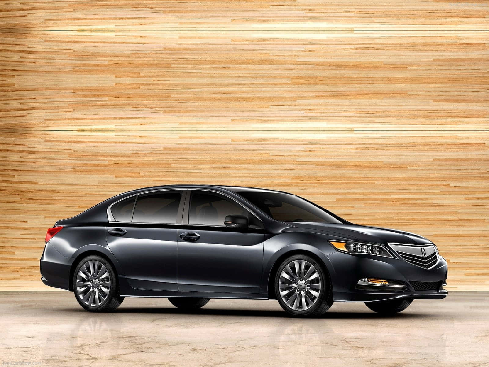 Sleek Acura Rlx Luxury Sedan In Motion Wallpaper