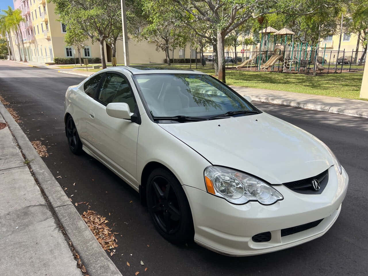 Sleek Acura Rsx In Stunning Metallic Blue Wallpaper