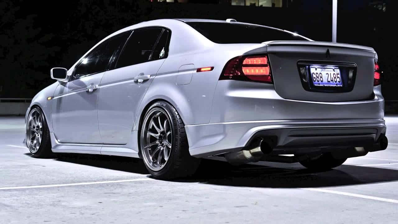 Sleek Acura Tsx In A Stunning Urban Setting. Wallpaper