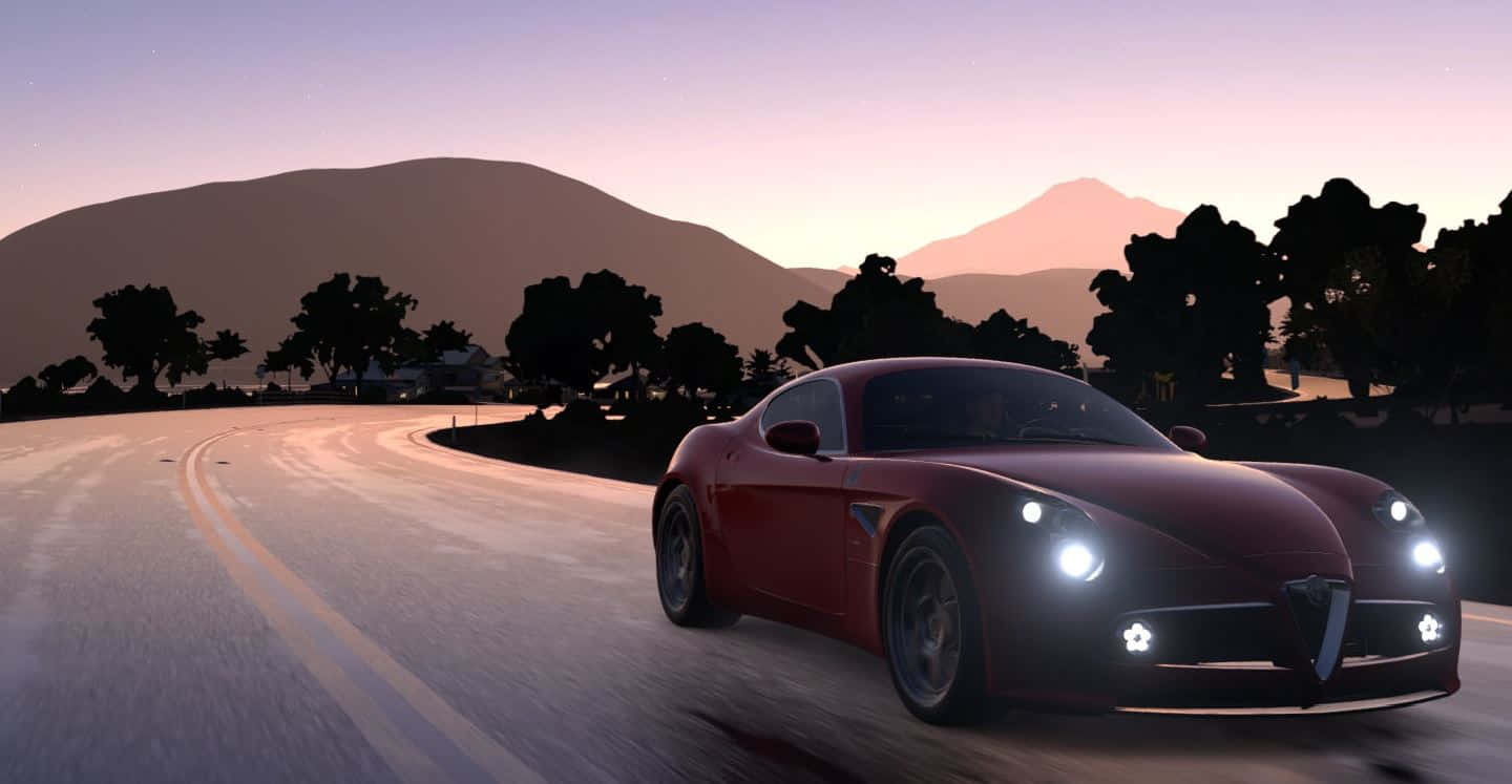 Sleek Alfa Romeo 8c Competizione In Action Wallpaper