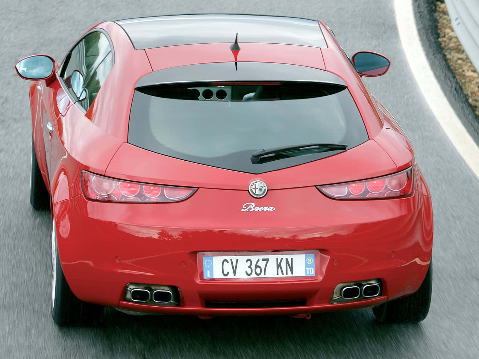 Sleek Alfa Romeo Brera In Motion Wallpaper