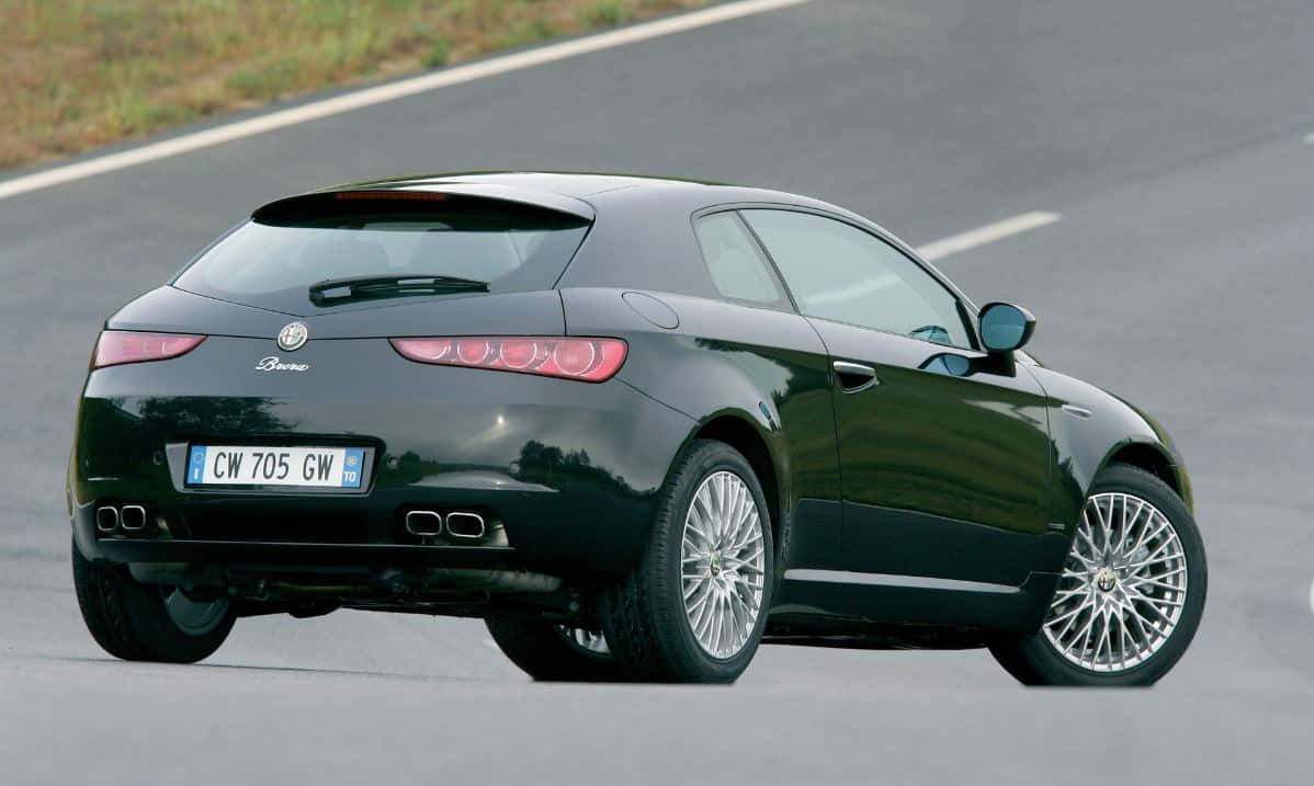 Sleek Alfa Romeo Brera In Motion Wallpaper