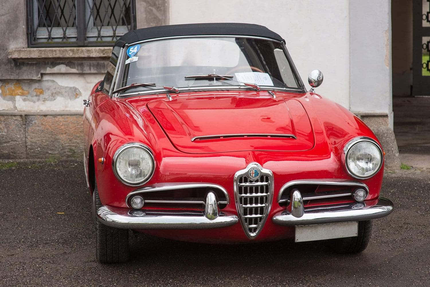 Sleek Alfa Romeo Spider In Its Full Glory Wallpaper