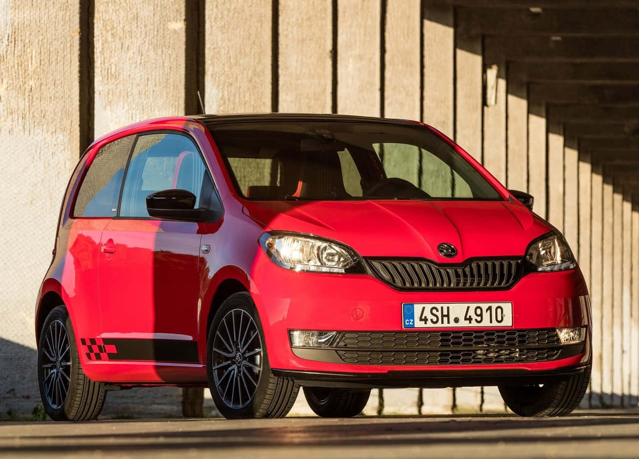 Sleek And Compact Skoda Citigo In Urban Environment Wallpaper