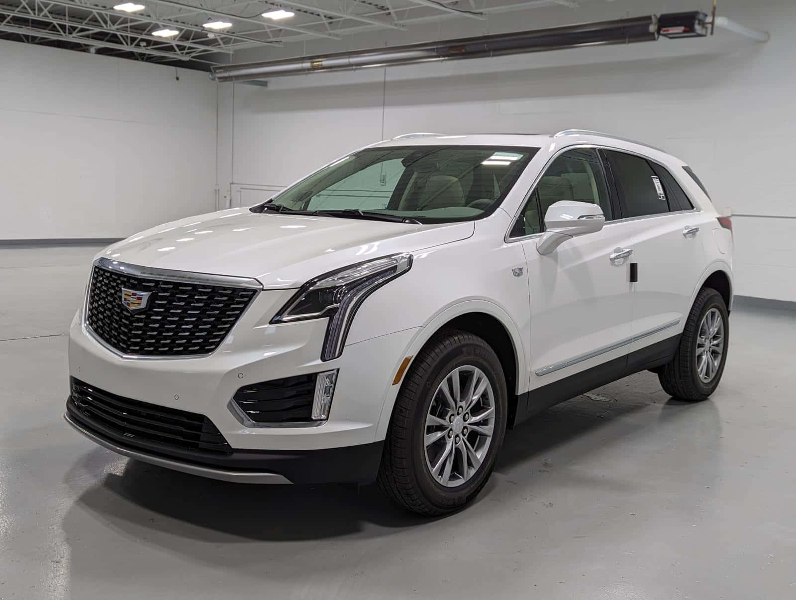 Sleek And Luxurious Cadillac Xt5 On The Road Wallpaper