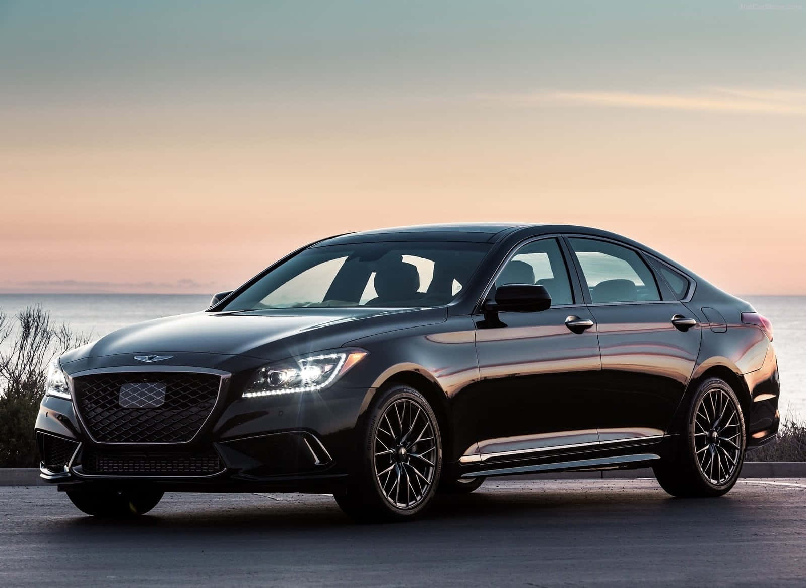 Sleek And Luxurious Genesis G80 In Motion Wallpaper