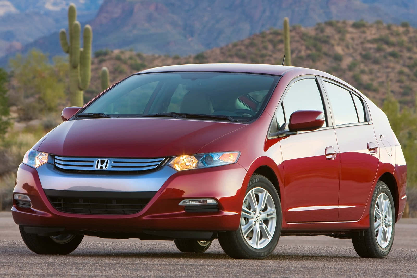 Sleek And Modern Honda Insight Hybrid On The Road Wallpaper