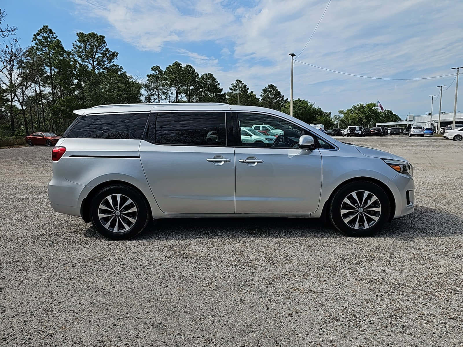 Sleek And Modern Kia Sedona Minivan Wallpaper