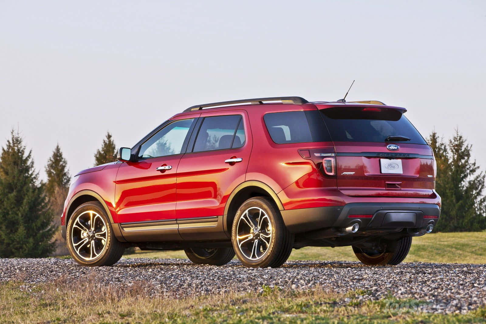 Sleek And Powerful Ford Explorer On The Road Wallpaper