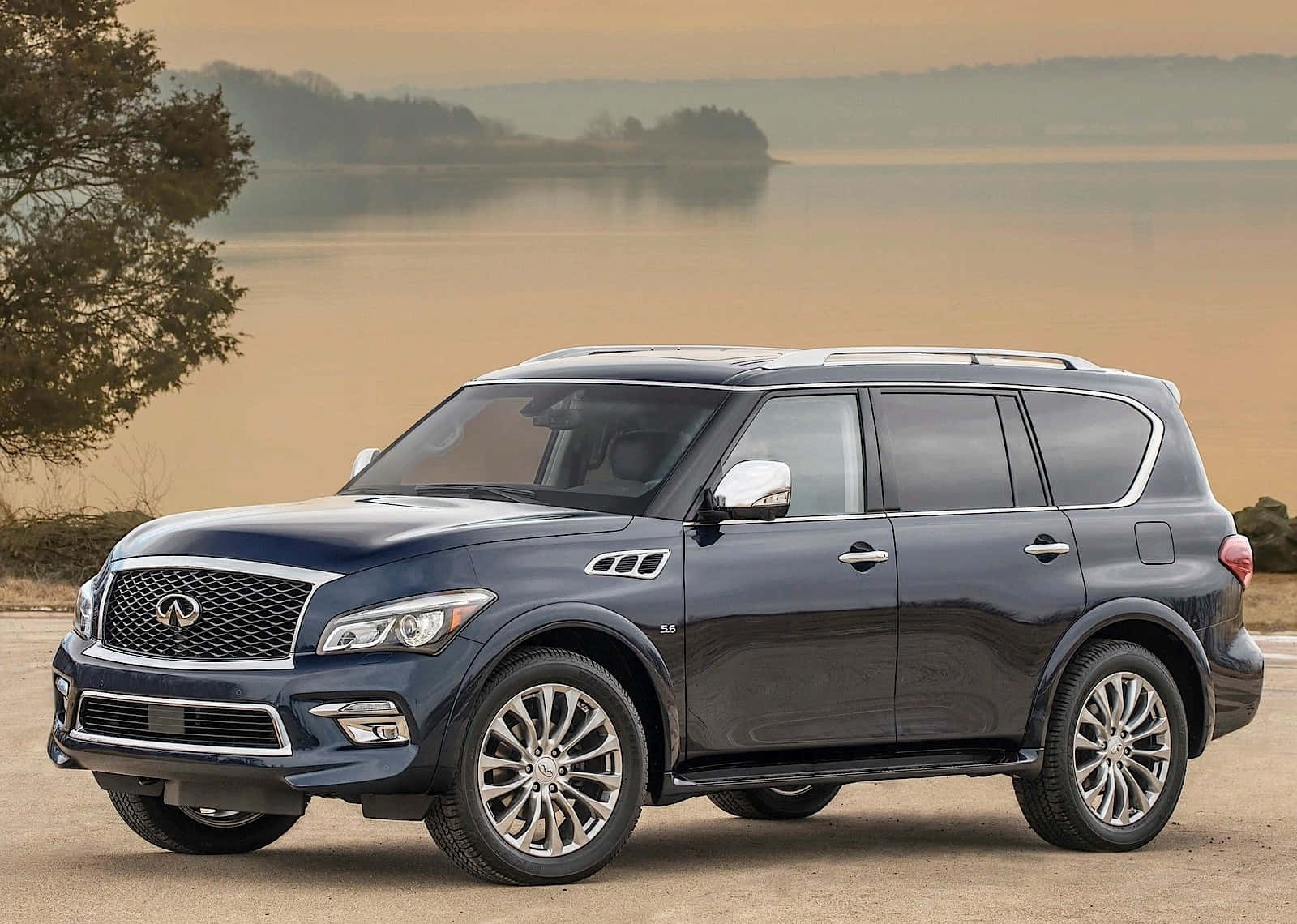 Sleek And Powerful Infiniti Qx80 On The Road Wallpaper