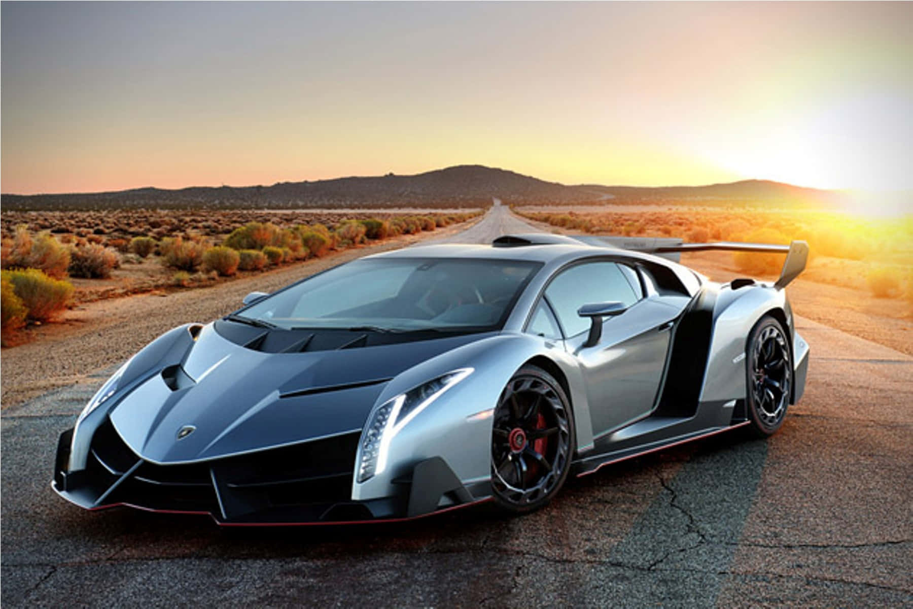 Sleek And Powerful Lamborghini Veneno On The Road Wallpaper