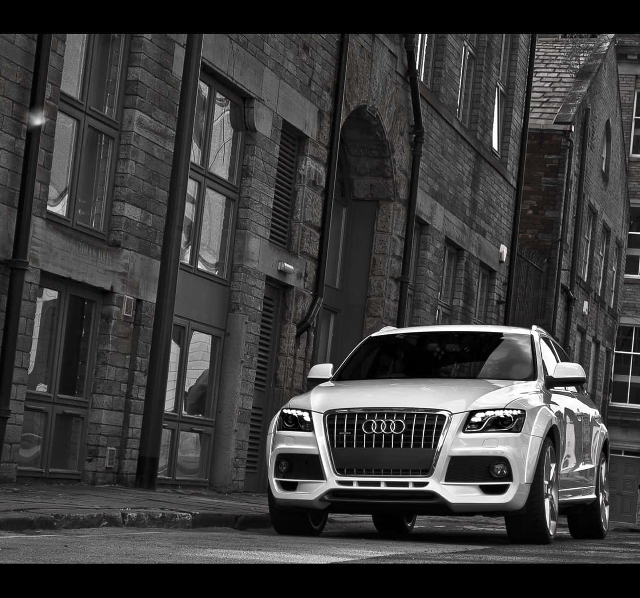 Sleek And Sophisticated Audi Q5 On The Road Wallpaper