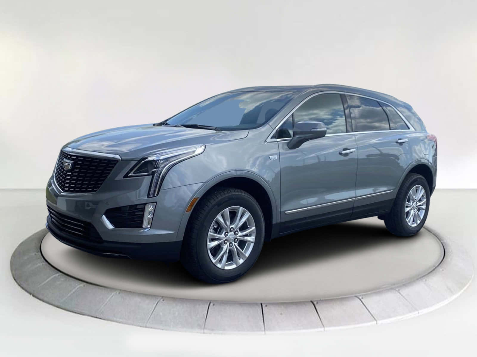 Sleek And Stylish Cadillac Xt5 On The Road Wallpaper