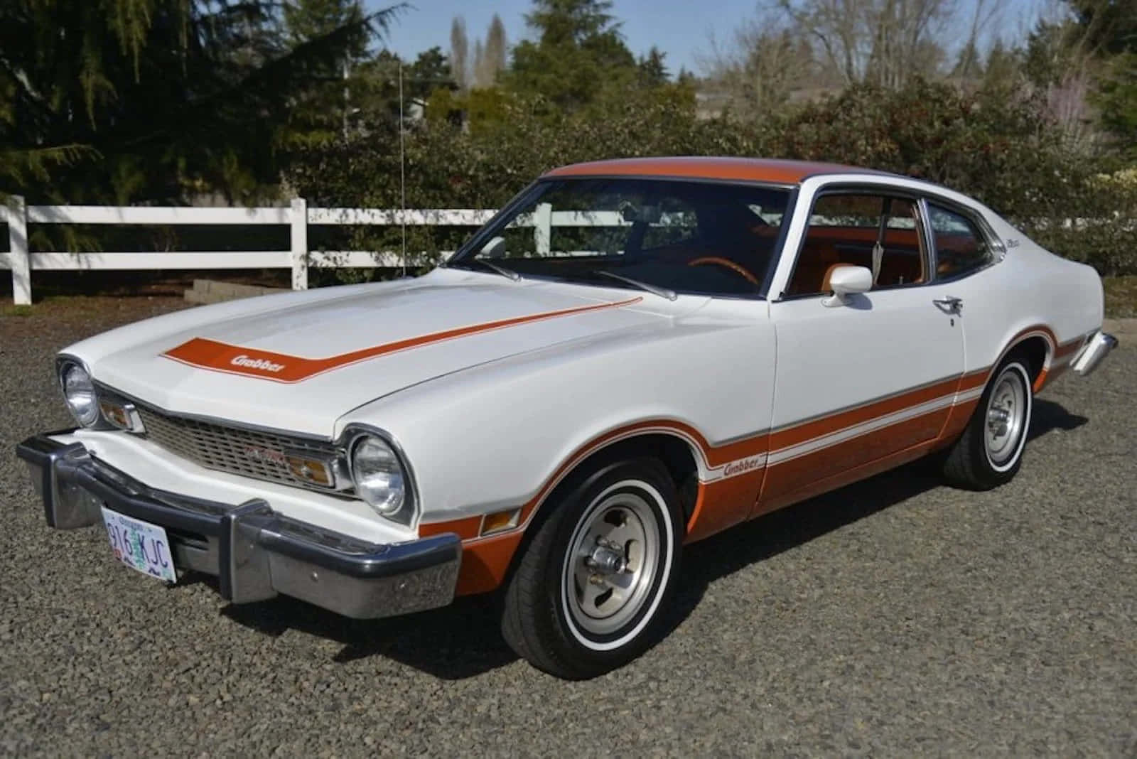 Sleek And Stylish Ford Maverick On The Open Road Wallpaper