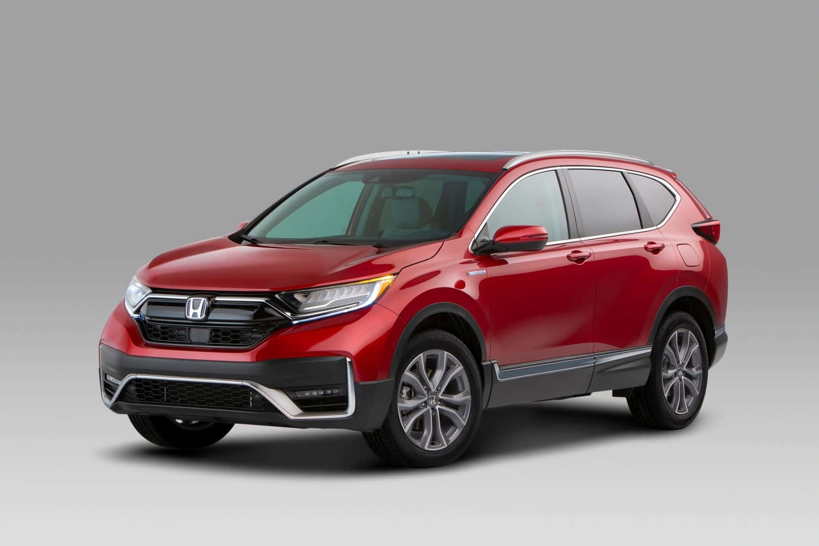 Sleek And Stylish Honda Cr-v On The Road Wallpaper