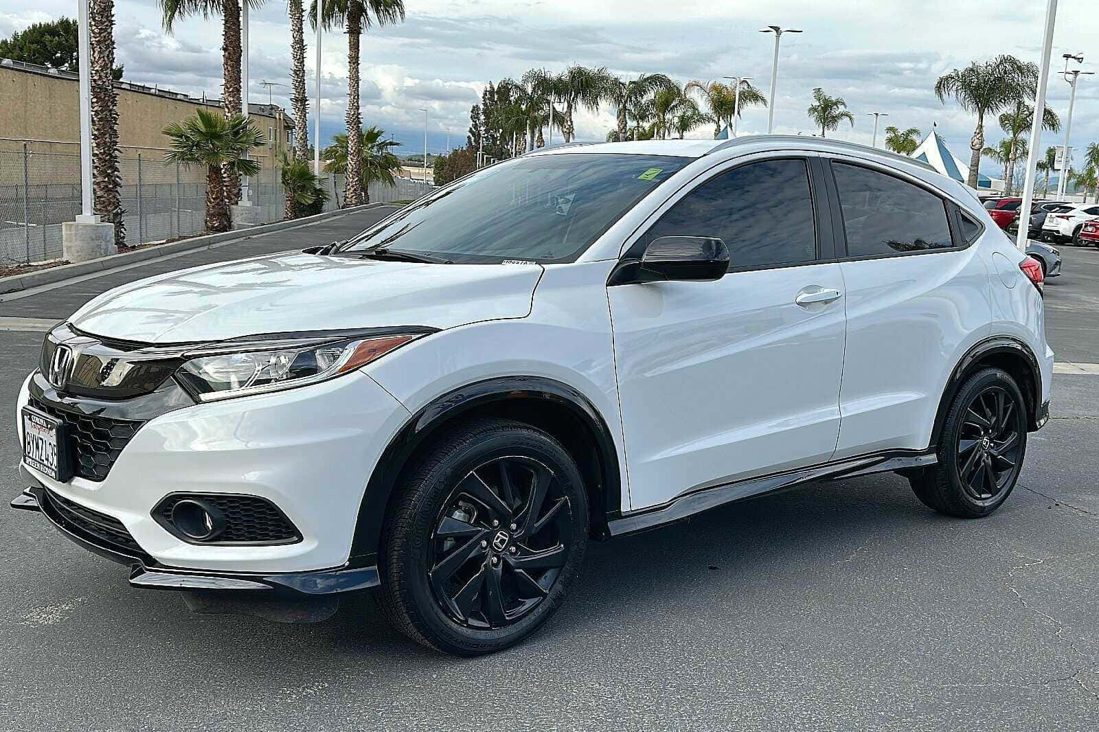 Sleek And Stylish Honda Hr-v In A Beautiful Landscape Wallpaper