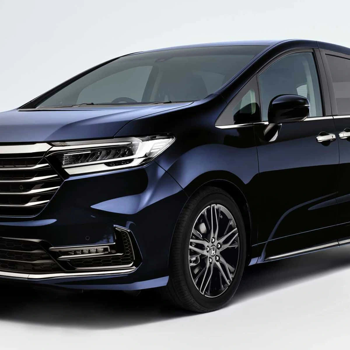 Sleek And Stylish Honda Odyssey In Action Wallpaper